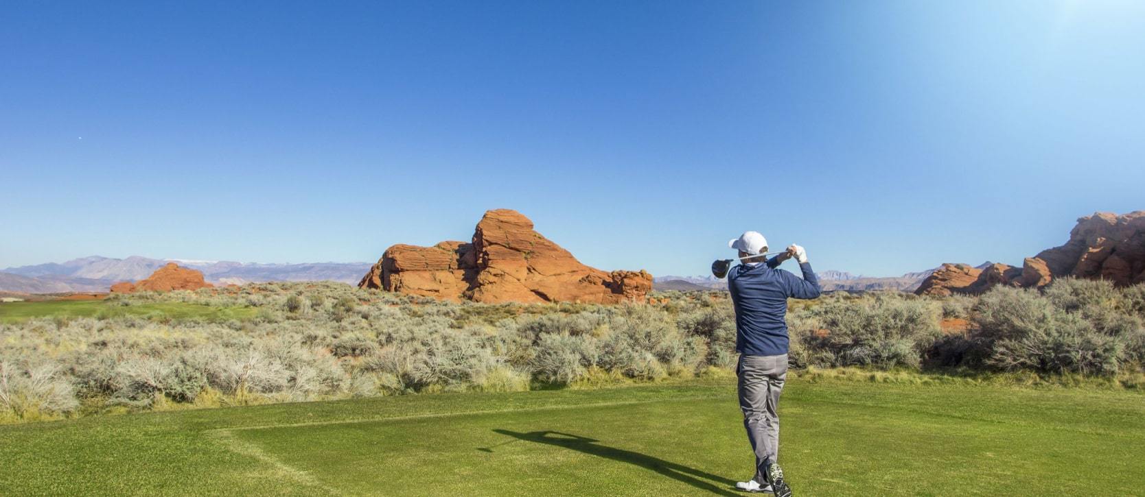 Man golfing on a golf course in Southern Utah
